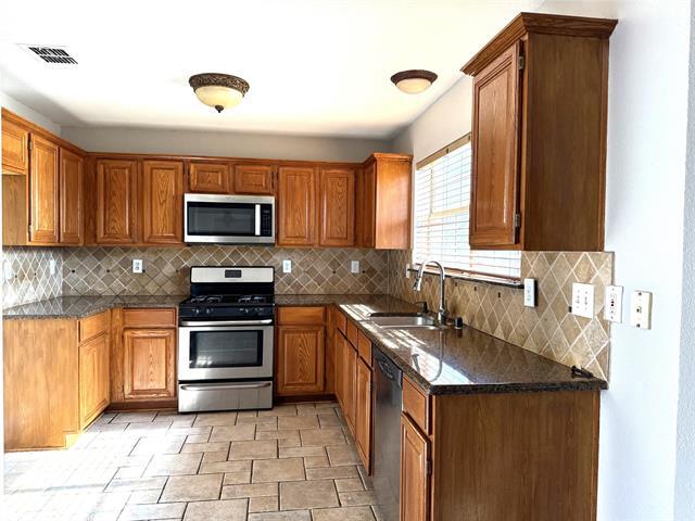 Building Photo - 8212 Tavaros Dr