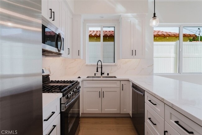 Building Photo - 6329 Ranchito Ave