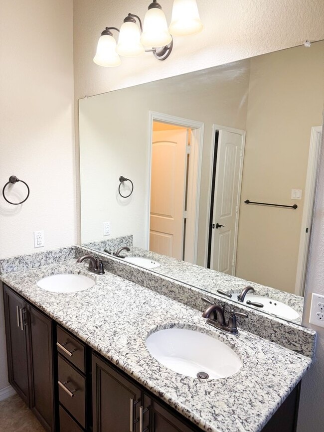 Building Photo - Popular DR Horton Sierra floor plan. 4 bed, 2 1/2 bath, 3 car garage, single story on a corner lo...