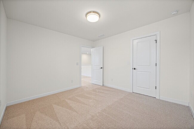 Building Photo - Classic finishes paired with an open, versatile layout!