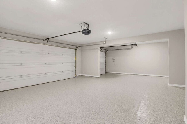 Building Photo - "Spacious 4-Bedroom Sanctuary with Cozy Fireplace in San Antonio's Prime Location!"