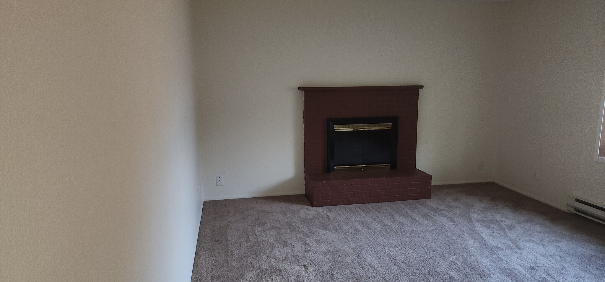 Living room with fireplace - 521 159th St E