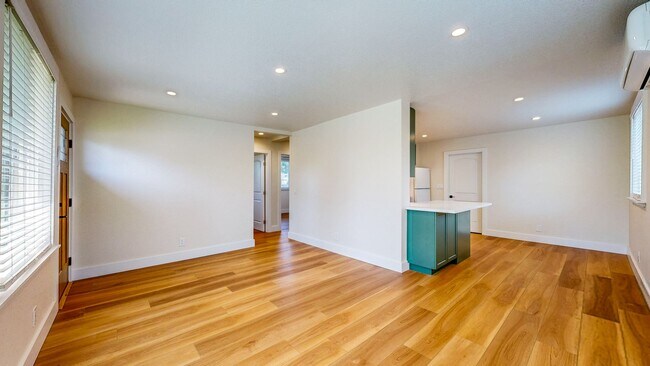 Building Photo - Bright Newly Refurbished Two Bedroom One Bath Single Family Home