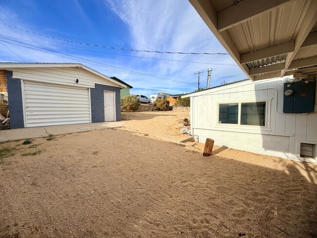 Building Photo - Modern 3-Bedroom Desert Bungalow with Stunning Views – Unfurnished - Price reflects MOVE IN SPECI...