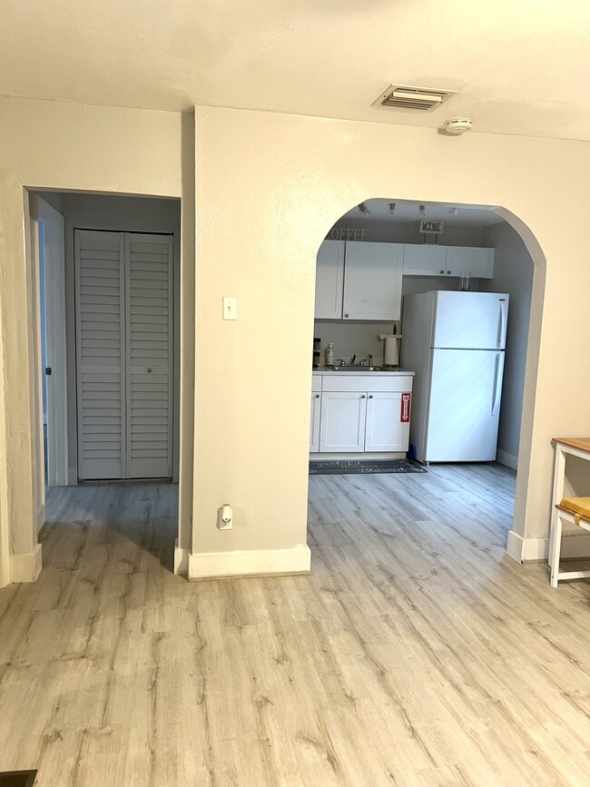 View into kitchen from living room - 201 Columbus Pky