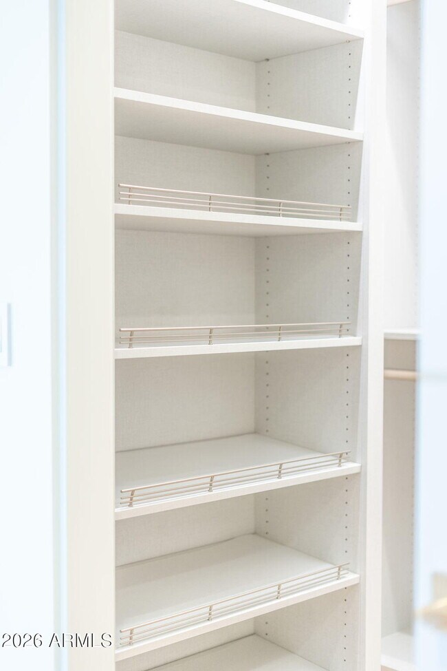 Building Photo - 6587 N Palmeraie Blvd