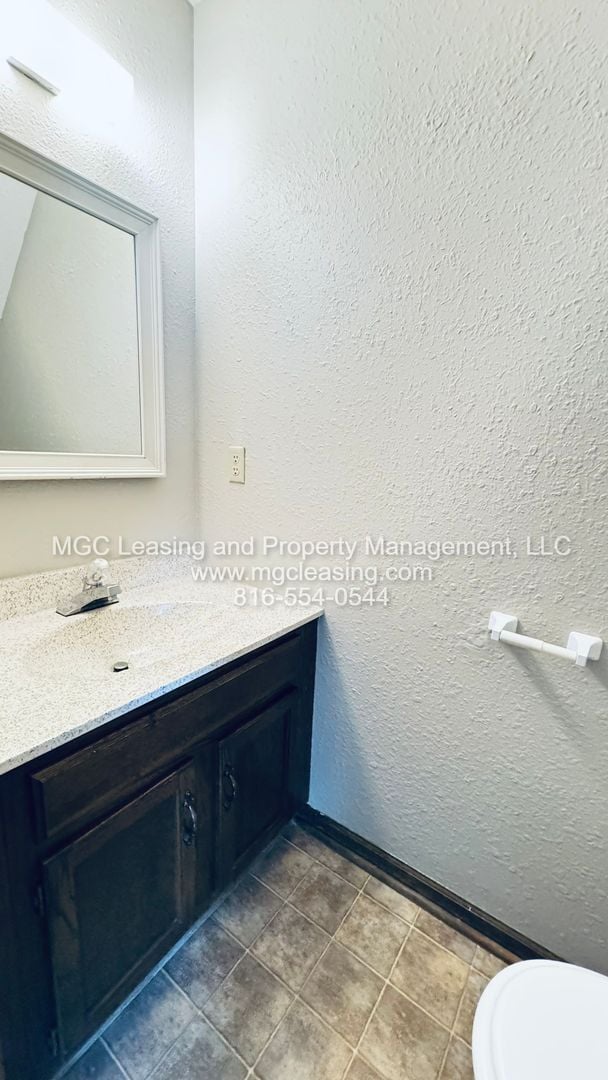 Building Photo - Corner Townhome with a Bedroom Balcony Overlooking Lake Tapawingo