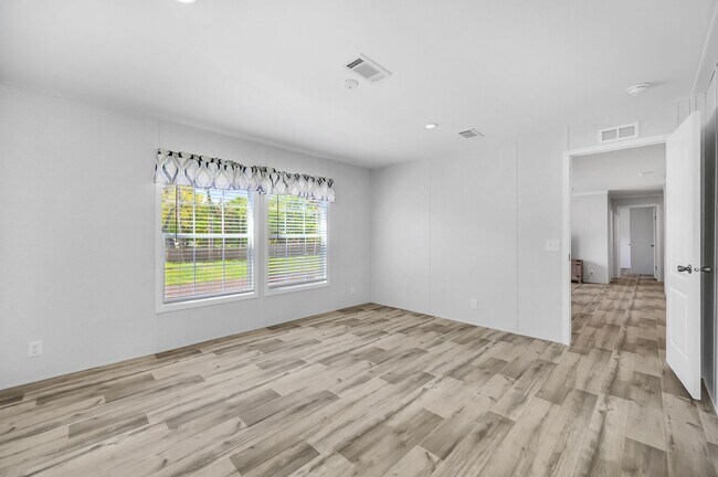 Building Photo - Experience exceptional living at its finest