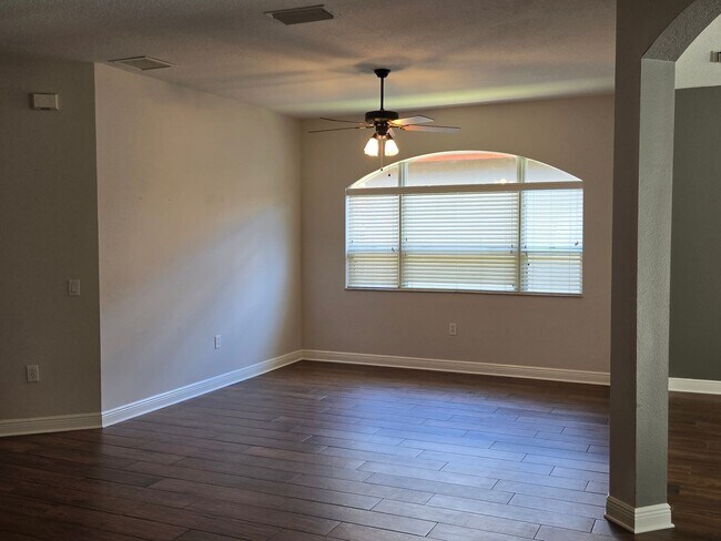 Building Photo - Freshly Painted 4BR/2BA Pool Home with Screened Pool & Spa – Move-In Ready!