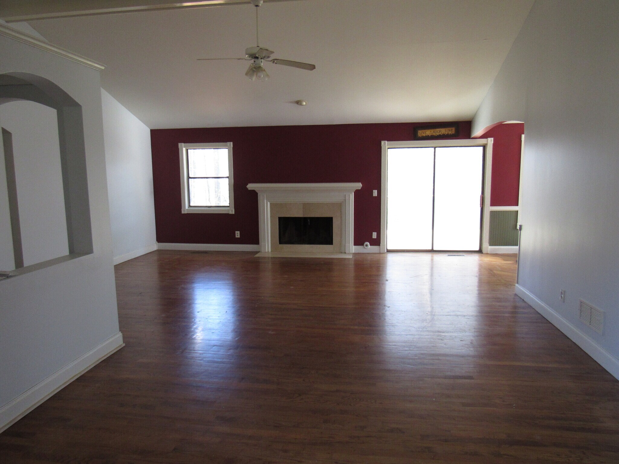 Large living room, fireplace, hardwoods throughout - 1273 W Wylie Bridge Rd