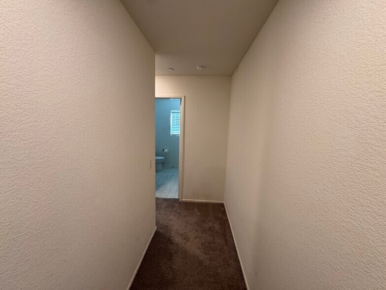 hallway top bedrooms 2 & 3 + hall bath - 15659 Whispering Creek Way