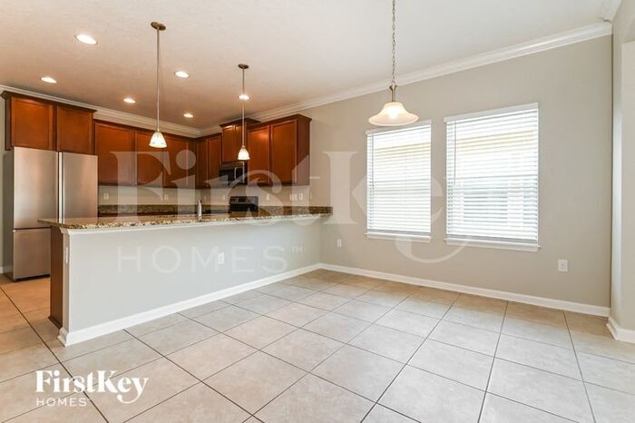 Building Photo - 8906 Devon Pines Dr