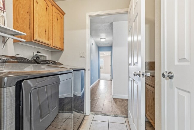 Building Photo - 4 Bedroom 2 Bath with Solar on a Large Corner Lot
