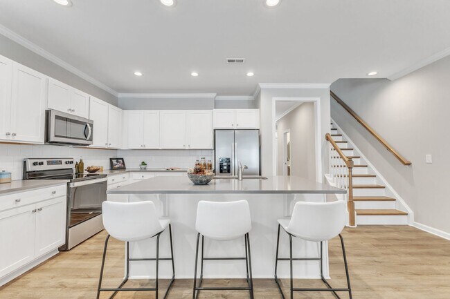 Building Photo - 3/3.5 Townhome Walking Distance to NC State