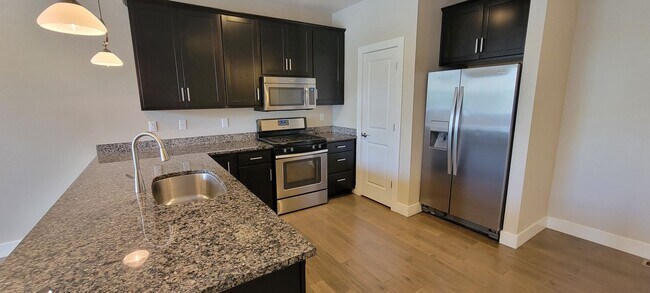 Building Photo - Spacious 3 level, 4 bedroom townhome with attached 2 car garage at Silver Meadows Townhomes on Lo...