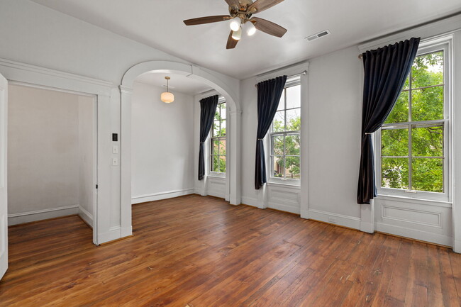 Hardwoods & Archway in elegant bedroom - 916 Hickory St