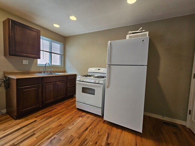 Building Photo - Highlands/Stadium Area Great Sized 1 Bedroom with Beautiful Hardwood Floors, Reserved Parking, Ex...