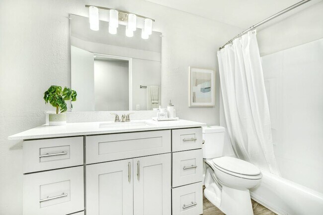 2-bedroom unit bathroom - Breakwater Apartments