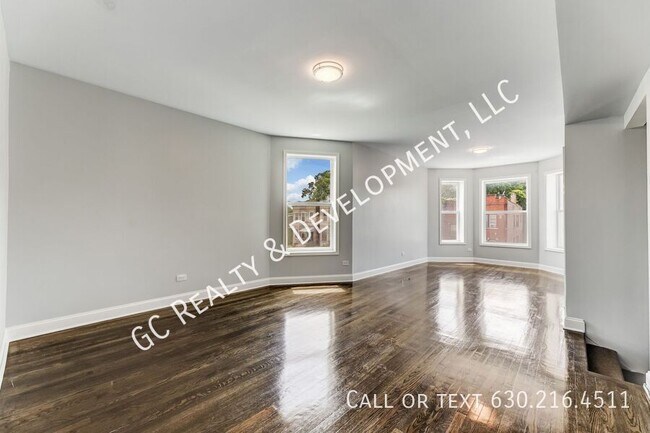Building Photo - 6433 S Vernon Ave