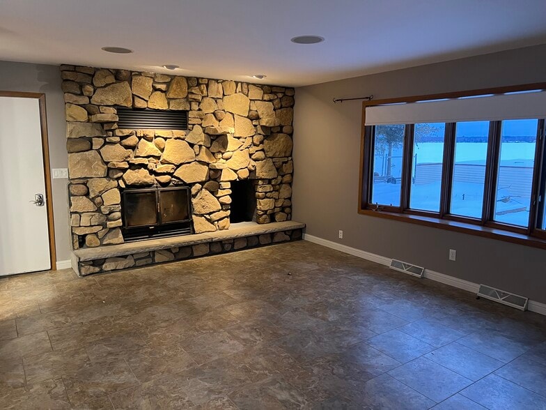 Living with wood fireplace - 12599 S White Potato Lake Rd