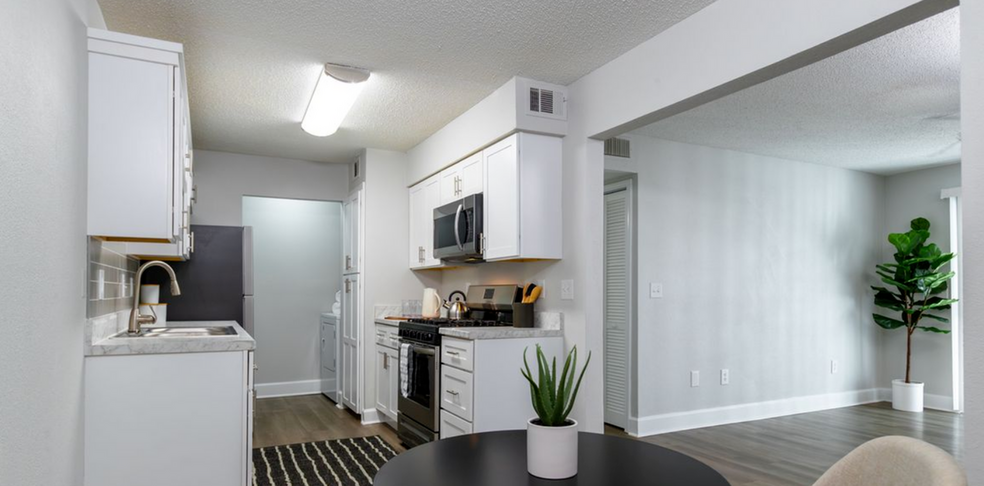 Kitchen with Upgraded Features - Reserve on Riverside Apartments