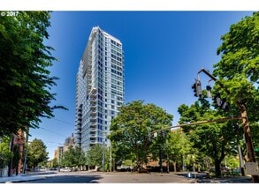 Building Photo - Modern 2-Bed/2-Bath Condo with Balcony & Prime Downtown Location