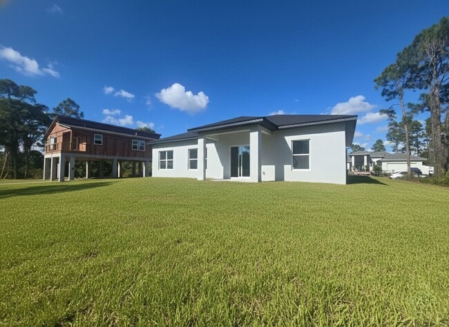 Building Photo - Brand new 4/2/2  House