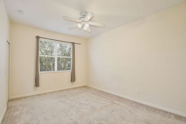 Building Photo - Beautiful 2/2.5 Cozy Townhome with a 1 Car Garage in the Gated Community of Victoria Pines - Orlando