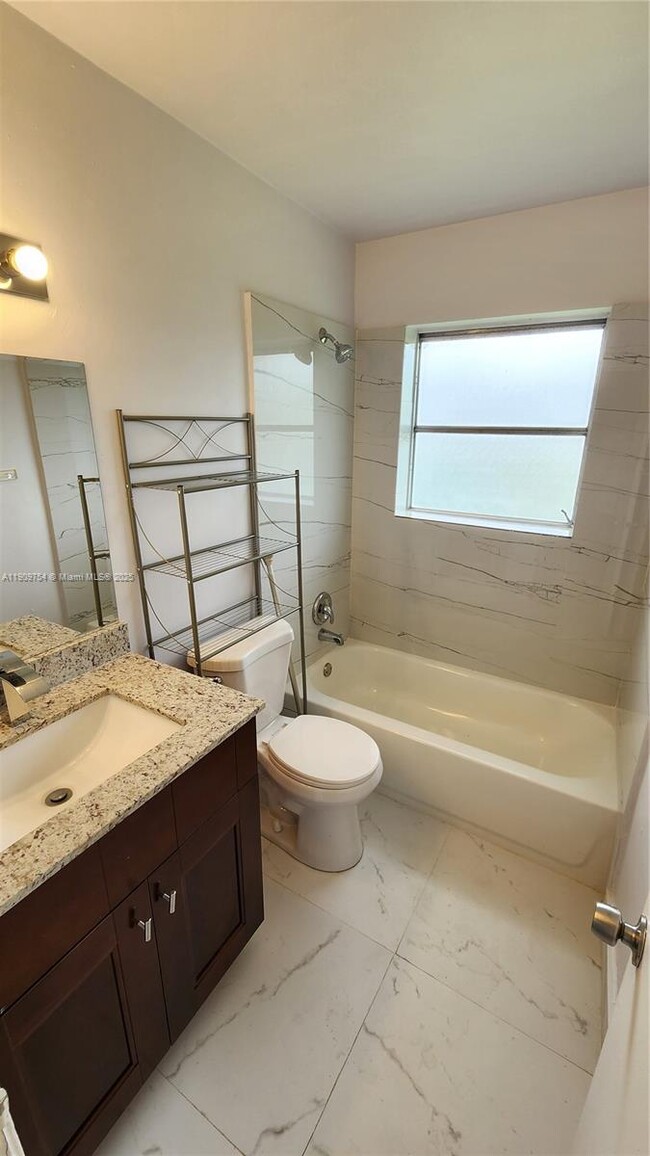 Building Photo - 3090 Coral Springs Dr