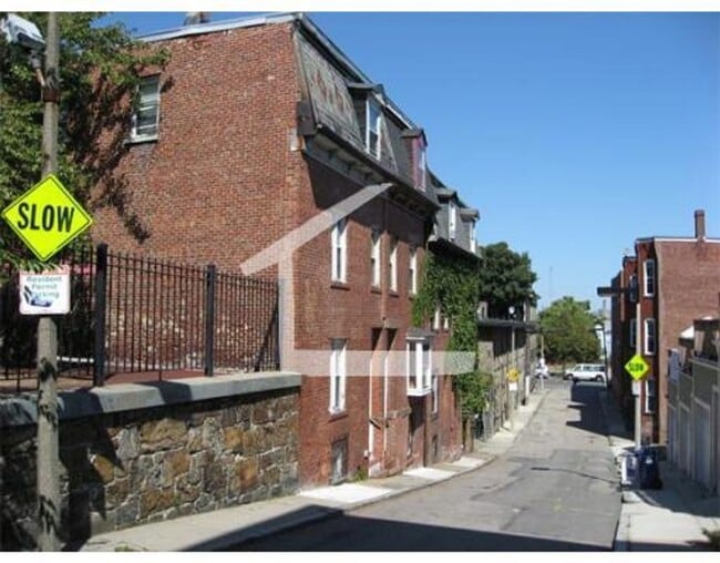 Building Photo - Mission Hill Area. Available September 1. In-Unit Laundry, Central Heat, Deck, Eat-in Kitchen.