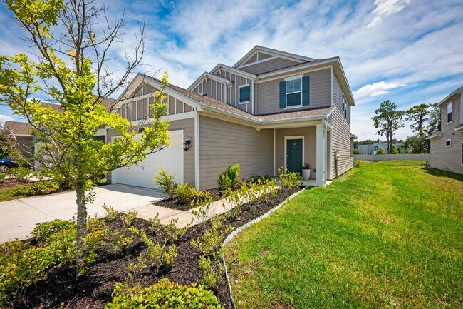 Building Photo - Spacious 4-Bedroom Home with Screened Pati...