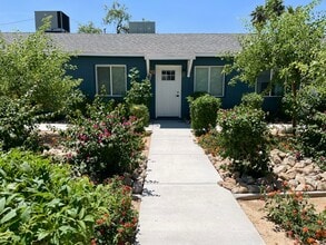 Building Photo - Boutique Living Meets Private Backyards and a Lush, Landscaped Courtyard Oasis at Turney Flats