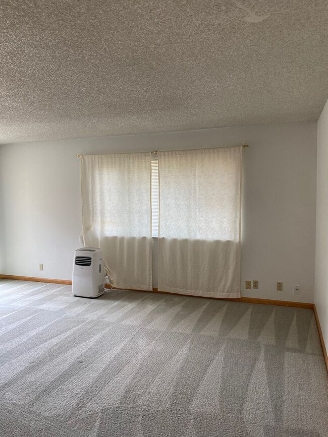 Building Photo - Beautiful Two BR Condo Across From Gateway...