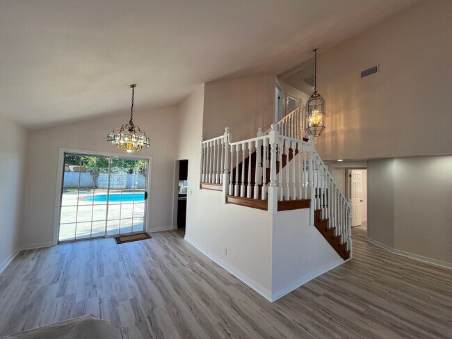 Building Photo - Reseda 4+3 w/fireplace, vaulted ceilings, new flooring, solar panels, + pool!