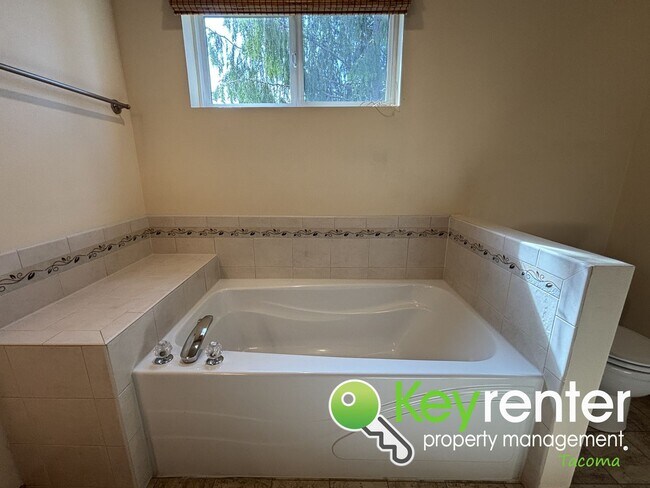 Building Photo - Elegant Browns Point Living with Backyard ...