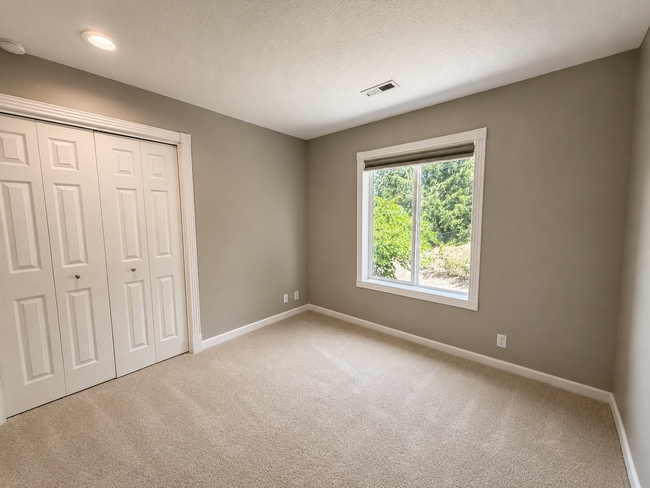 Building Photo - Light-Filled 3 Bedroom Retreat with Waterfall & Fully Fenced Yard