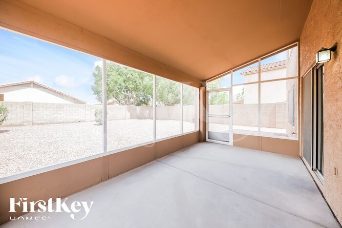 Building Photo - 6968 W Aire Libre Ave