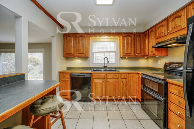 Building Photo - Discover what it feels like to LOVE where you LIVE!