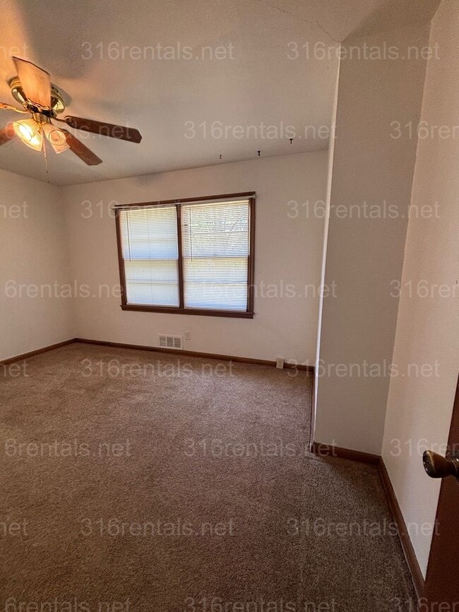 Building Photo - Three bedroom one bath house available now!