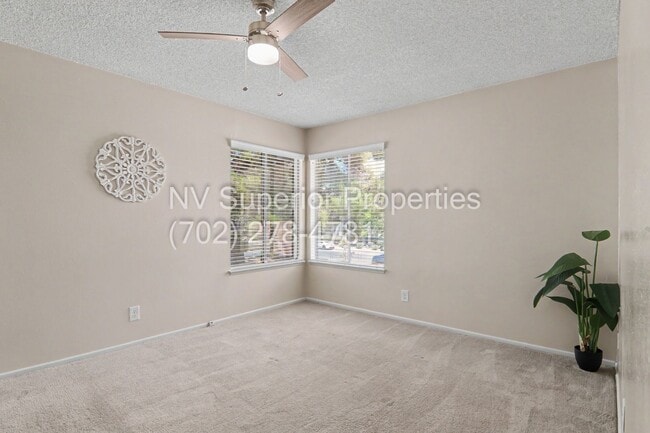 Building Photo - SE!! Close to UNLV!! 2 Bedroom 2 story!! 1 Car Carport!! Fully Furnished!! Community Pool!! and T...
