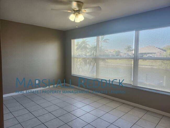 Building Photo - 3 BED 2 BATH SINGLE FAMILY HOME ON FRESH WATER CANAL WITH DOCK