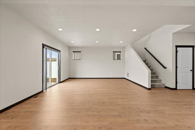 Building Photo - Spacious 4-Bedroom, 2.5 Bath, Two-Story Gem with a Fenced Yard!