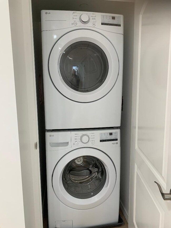 SIMILAR BUT THIS UNIT AS THE WASHER AND DRYER NEXT TO EACH OTHER WITH SHELVING - 15 Water St