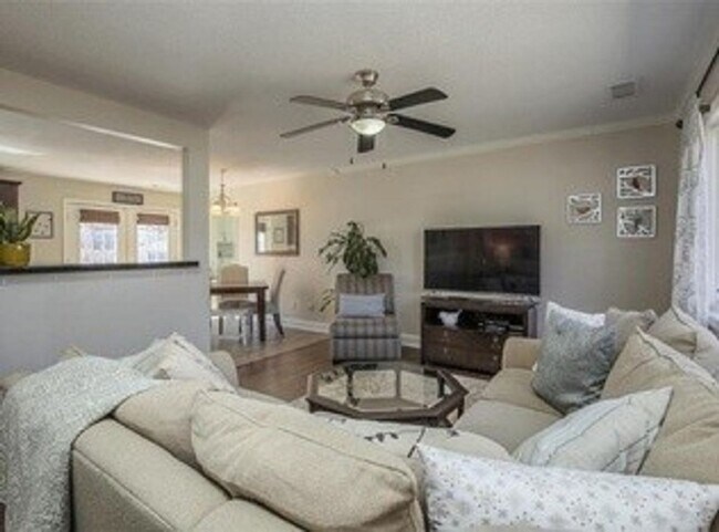 Building Photo - {5611} Updated OP Ranch + Two Car Garage + Fenced Yard and Stamped Concrete Patio Perfect for Spr...