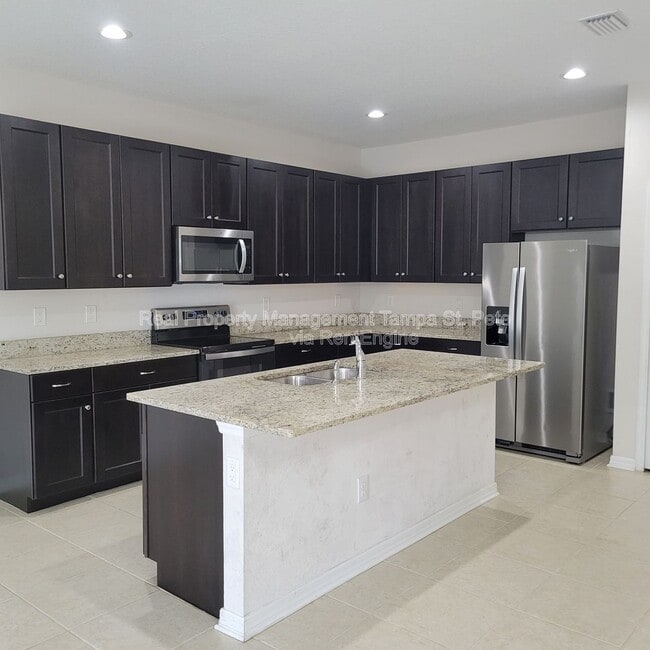 Building Photo - 6409 Tillandsia Pl