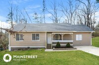 Building Photo - 5985 Creekwood Rd
