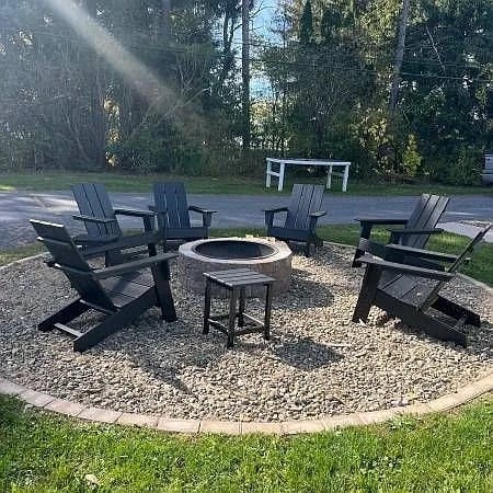 Fire pit with adirondack chairs, shared with unit 1028 - 1026 N Atherton St