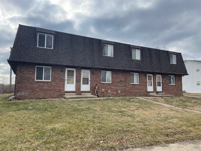Building Photo - Up Where We Belong — Spacious 2-Story Townhome with Basement