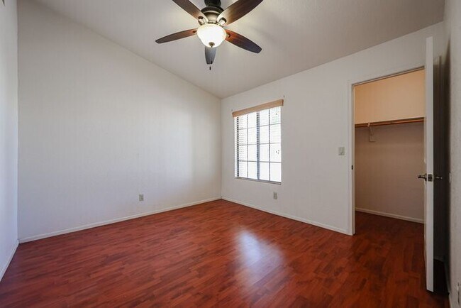 Building Photo - Welcome to this stunning 4-bedroom, 2-bath...
