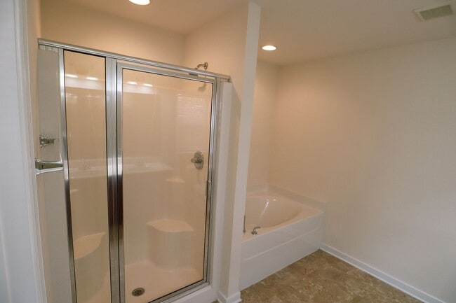 Building Photo - Spacious 4BR Home with Garage Steps from C...